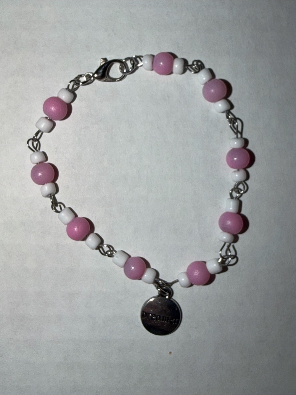 Pink and White Beaded Charm Bracelet with Silver Disc